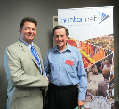 Michael Sharpe with HunterNet CEO John Coyle.